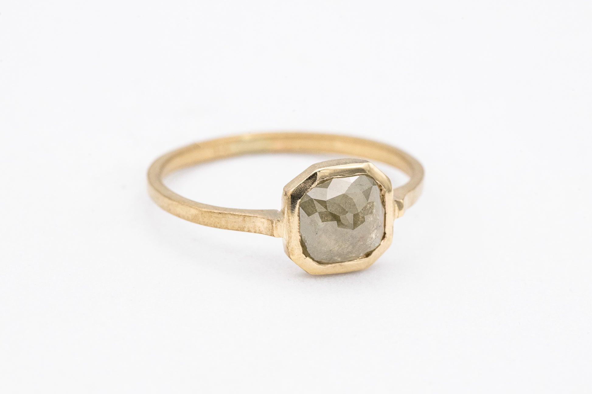A handmade Rose Cut Gray Diamond Ring in 14k Yellow Gold by Cassin Jewelry.
