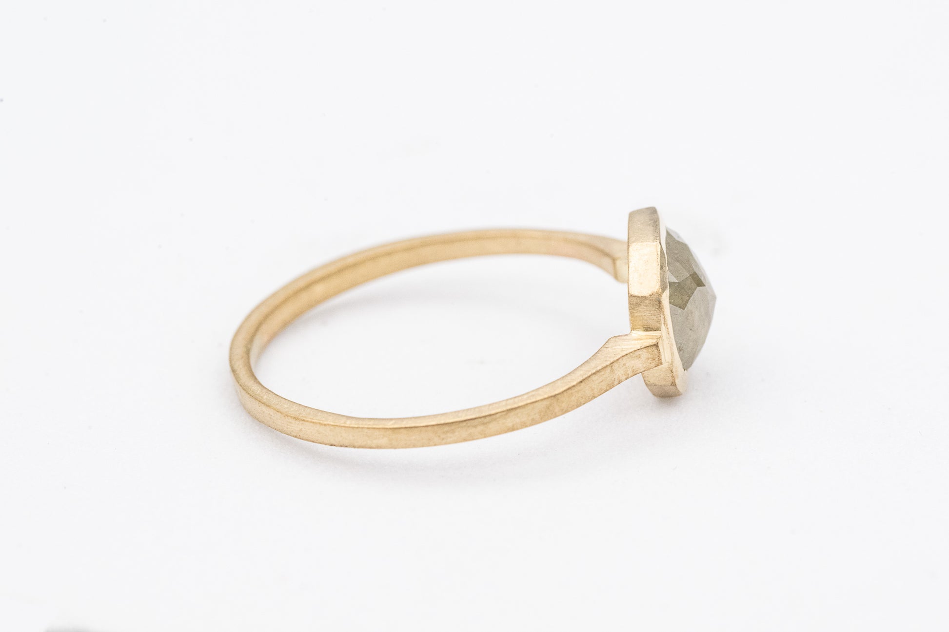 A handmade Gray Diamond Ring in 14k Yellow Gold from Cassin Jewelry.