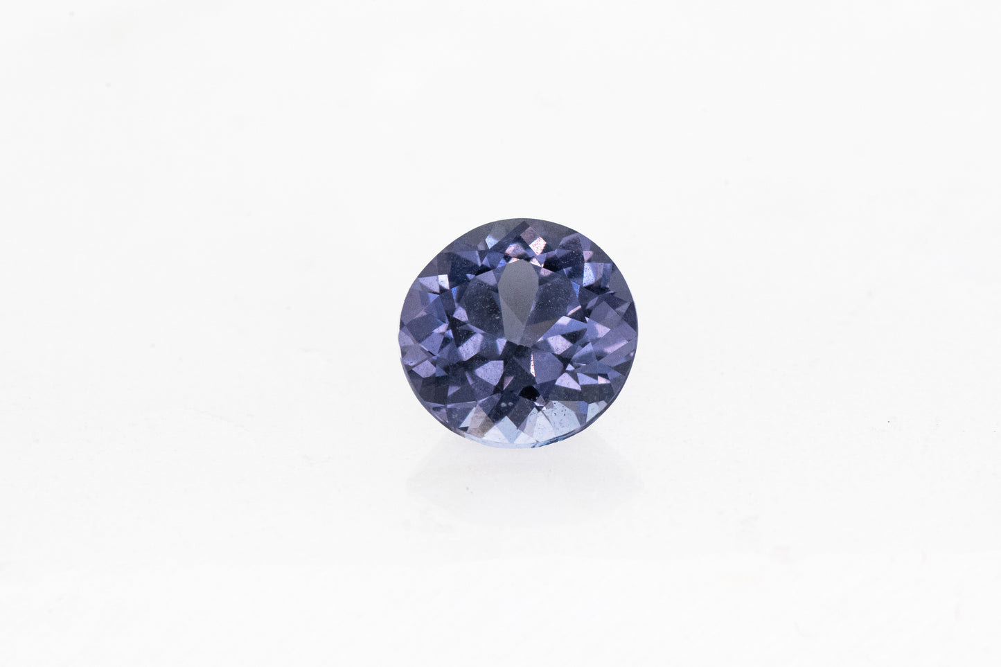 A handmade Blue Spinel Cassin jewelry on a white background.