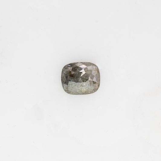 A Grey Rose Cut Diamond 9x7MM on a white surface, handcrafted by Cassin Jewelry.