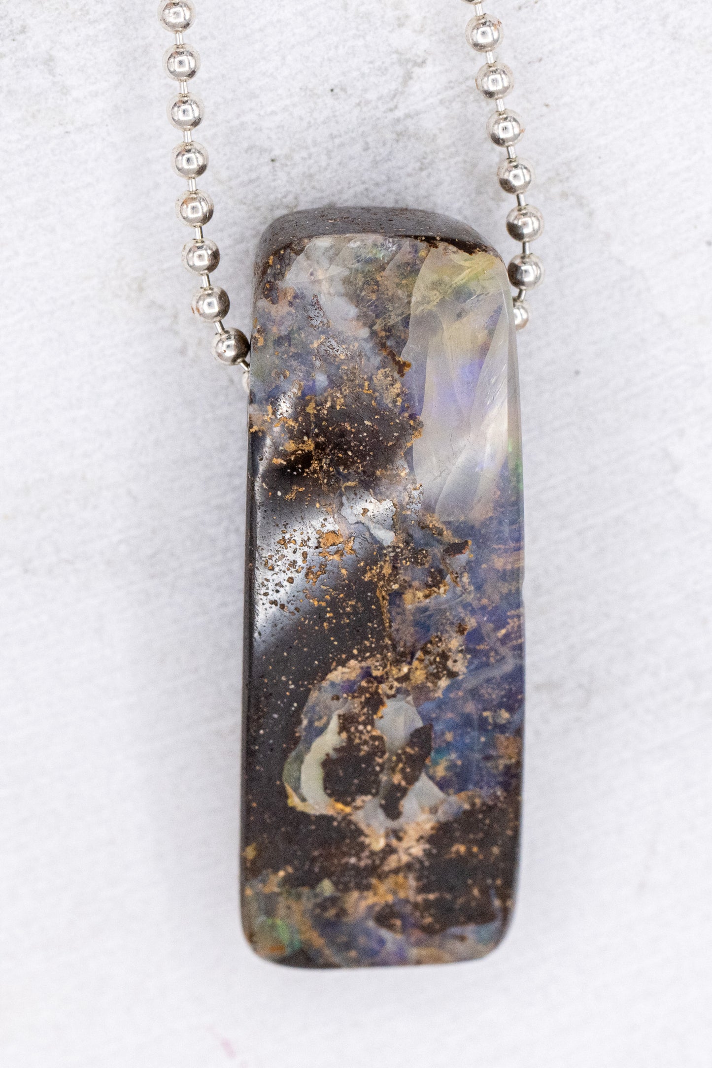 Handmade cassin jewelry necklace with Australian Opal on a silver chain.