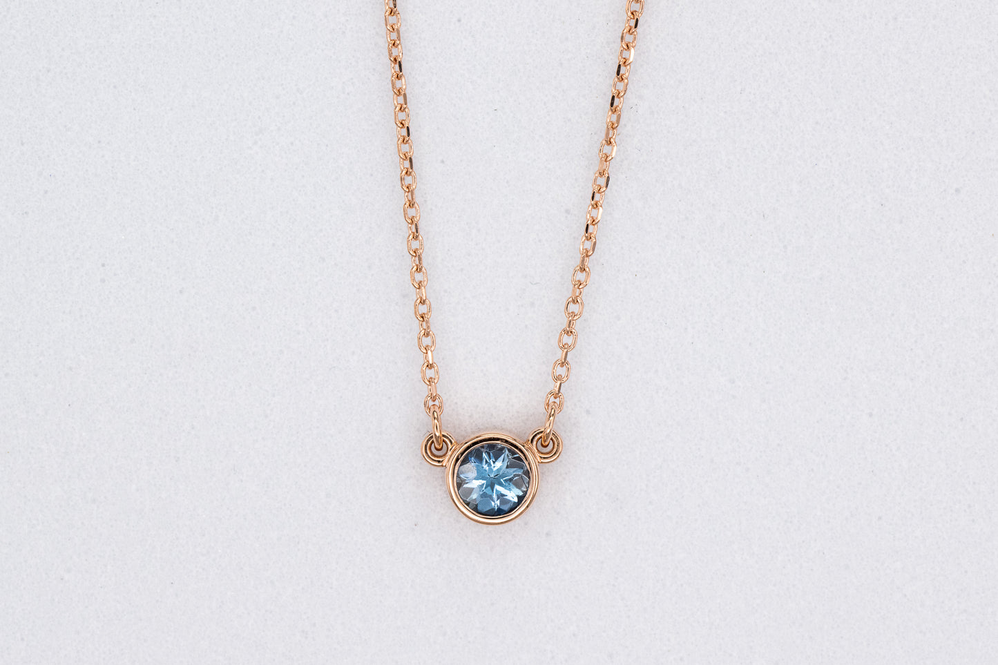 Handmade Aquamarine Rose Gold Necklace by Cassin Jewelry.