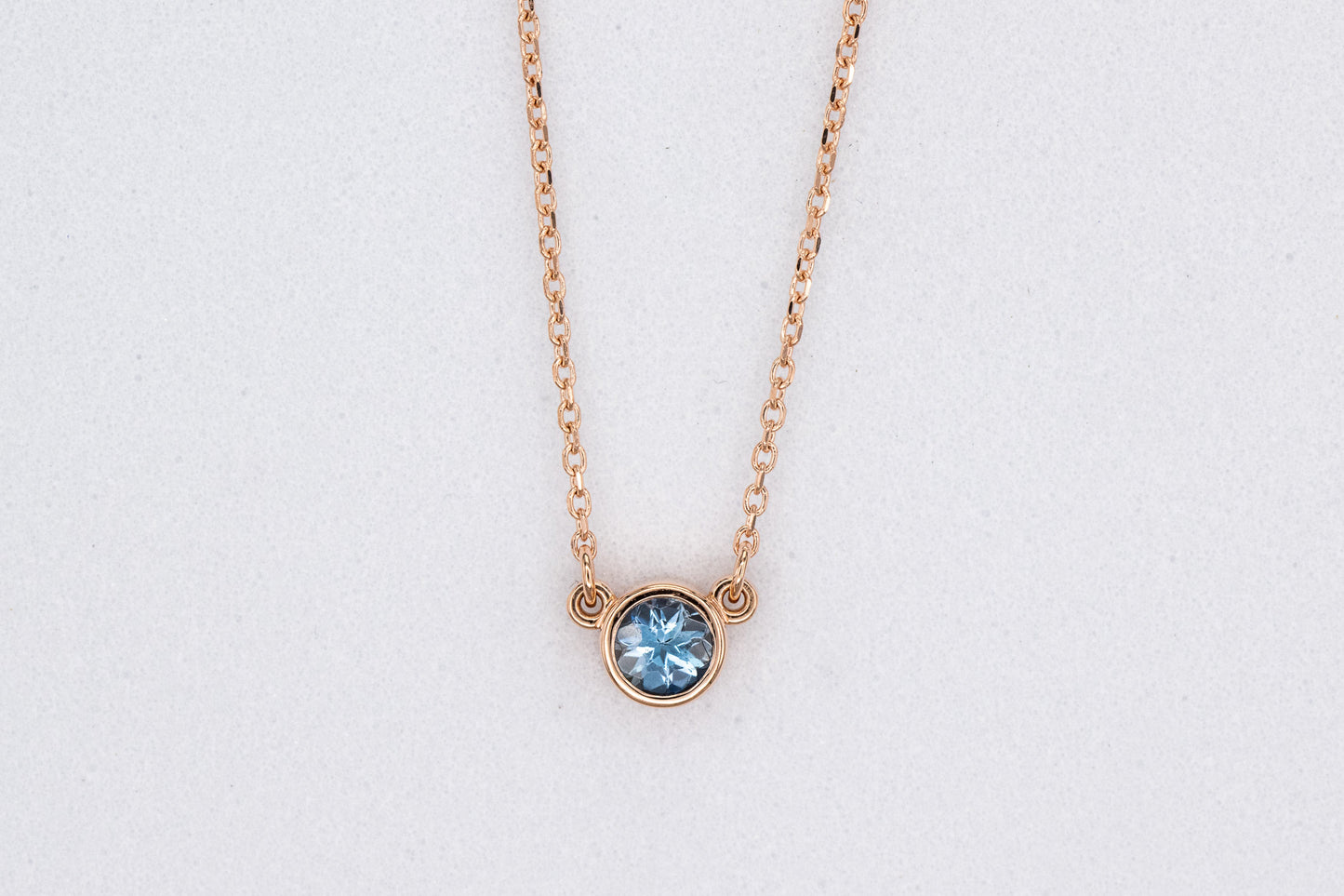 Handmade Aquamarine Rose Gold Necklace by Cassin Jewelry.