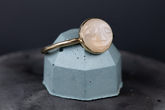 A White Moonstone Face Ring in Recycled 14k Yellow Gold, a handmade jewelry by Cassin.