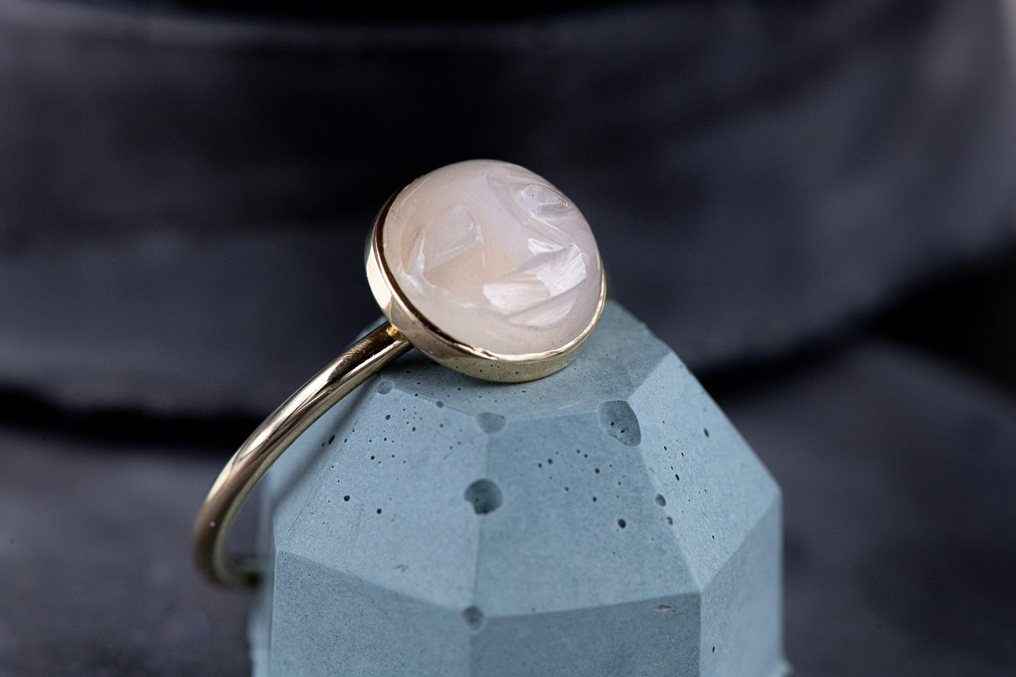 A handmade White Moonstone Face Ring in Recycled 14k Yellow Gold, crafted by Cassin Jewelry.