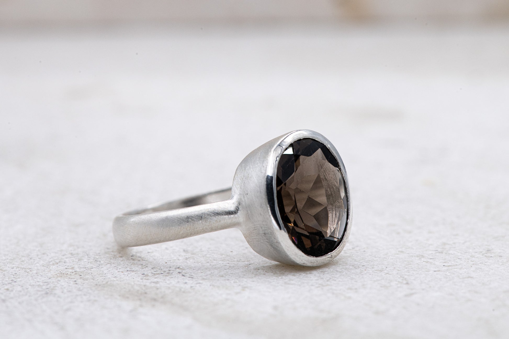 A handmade Solitaire Smoky Quartz Ring from Cassin Jewelry.