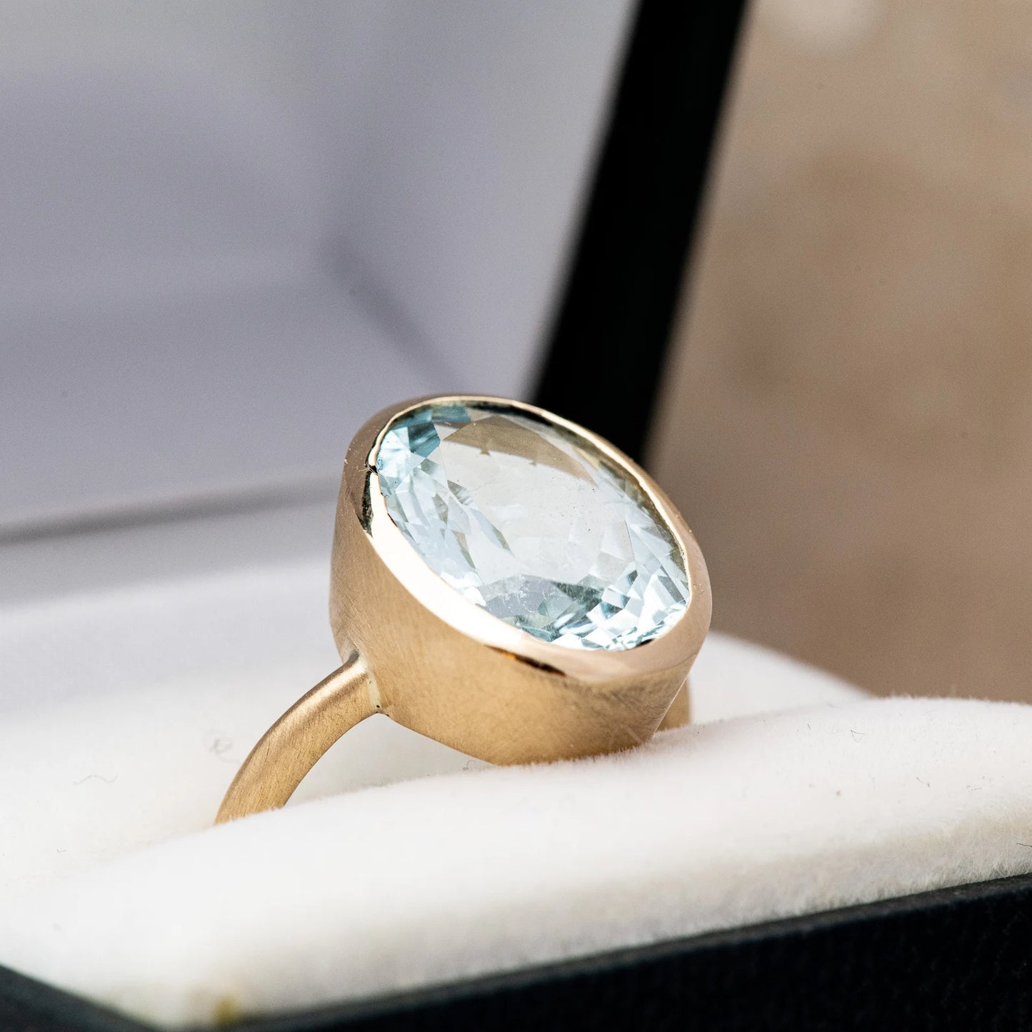 A Handmade Aquamarine Ring in Yellow Gold.