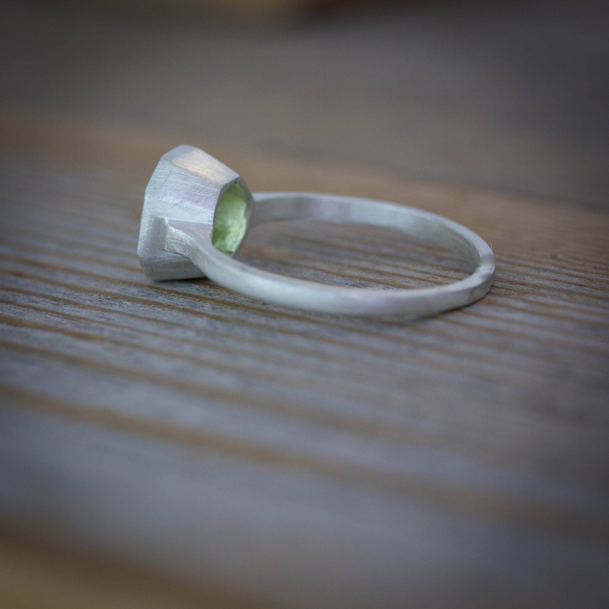 A handmade Peridot Ring in sterling silver, perfect for August birthdays.