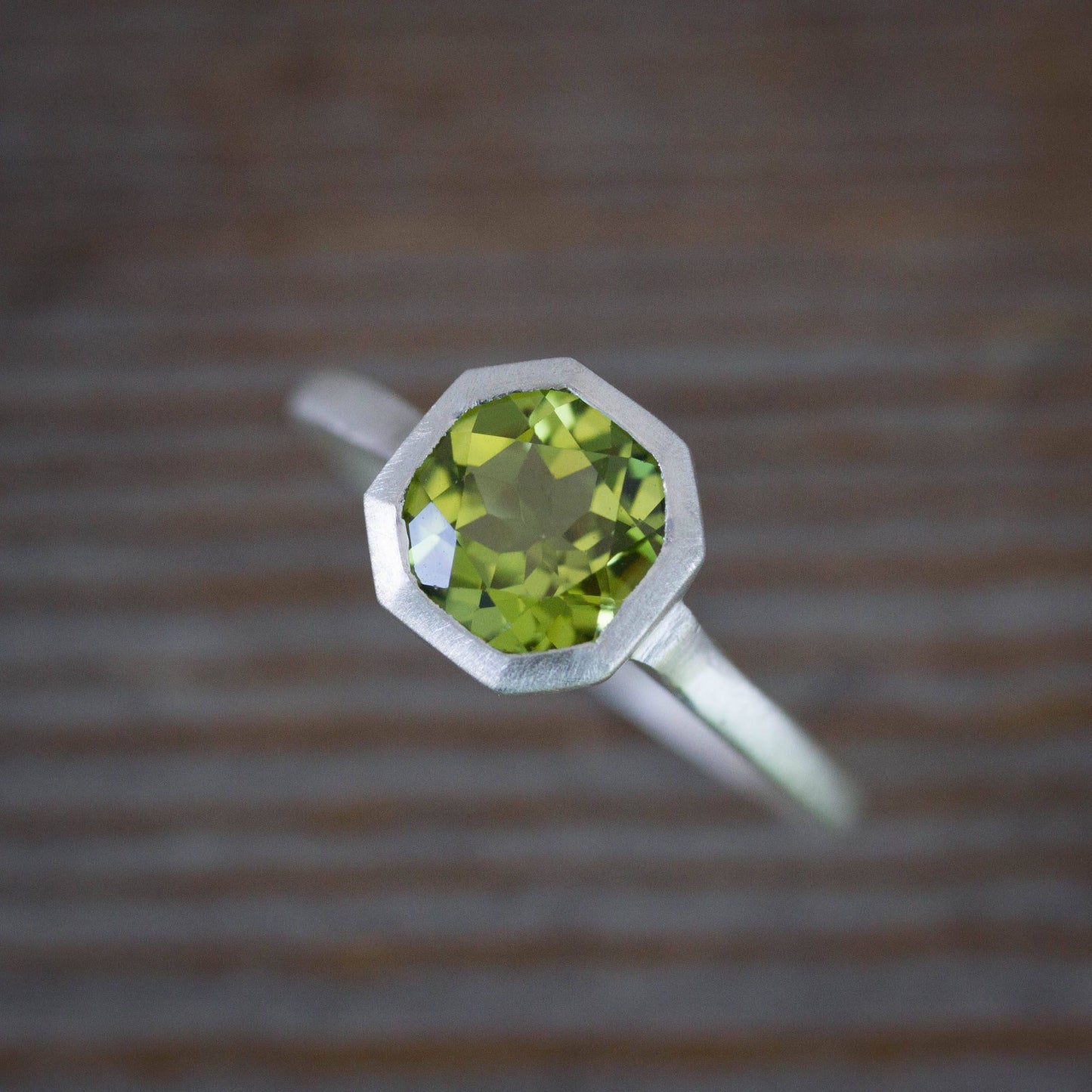 A Peridot Ring in August Birthstone, handmade jewelry set in sterling silver by Cassin Jewelry.