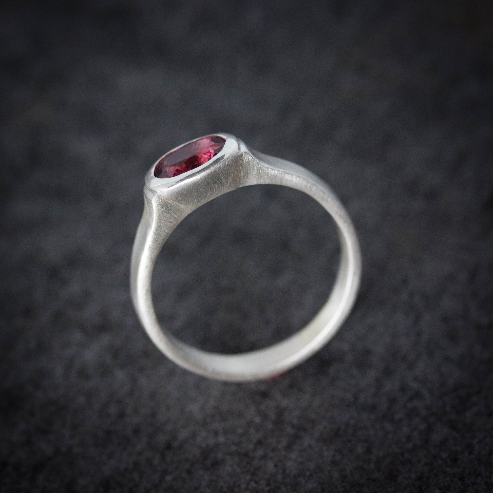 A Pink Tourmaline Wide Band Ring, Brushed Silver With Low Profile, Size 7 Oval Gemstone Solitaire and October Birthstone with handmade jewelry.