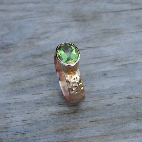 Handmade Peridot Ring in Rose Gold with a green peridot stone.