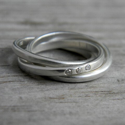 Handmade Celtic Wedding Ring with three diamonds by Cassin Jewelry.