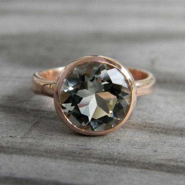 A Handmade Round Green Amethyst Ring, in Rose Gold, with a green topaz stone.