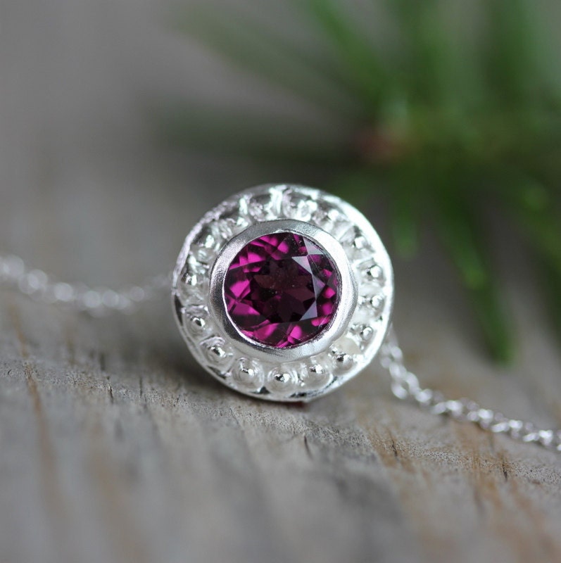 Handmade Pink Rhodolite Garnet Slide Necklace with a purple stone.