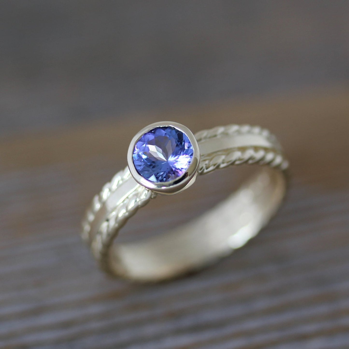 Handmade Royal Blue Tanzanite and 14k Yellow Gold Gemstone Ring from Cassin Jewelry Collection.