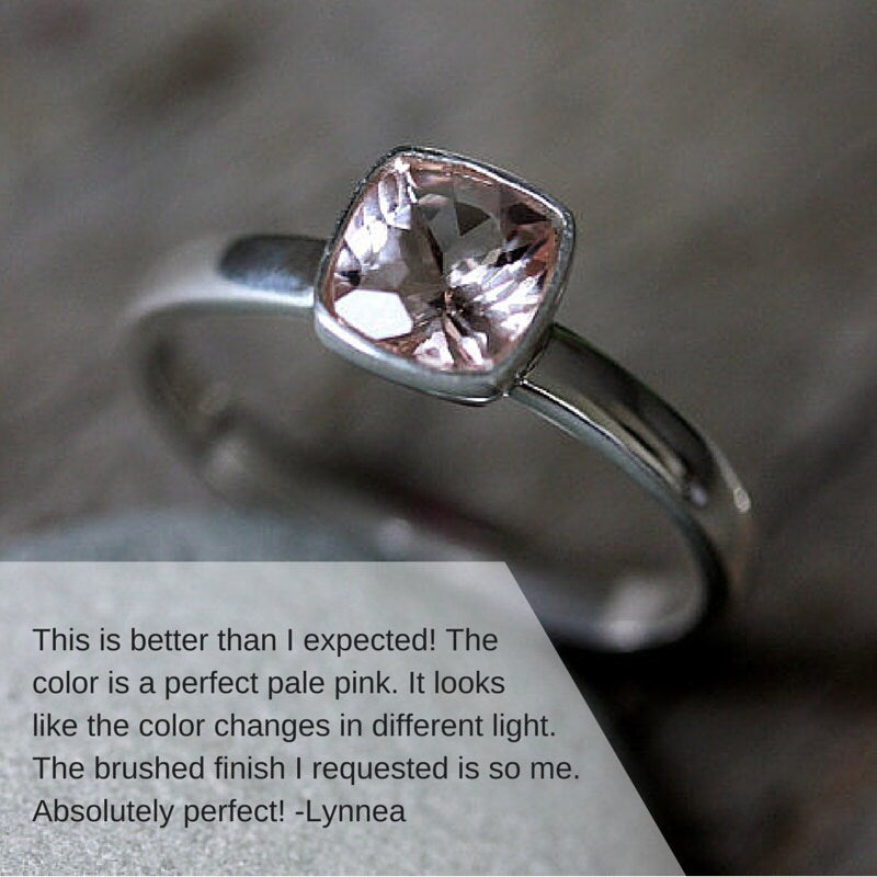 A handmade Silver Cushion Pale Pink Gemstone Ring by Cassin Jewelry with a quote on it.