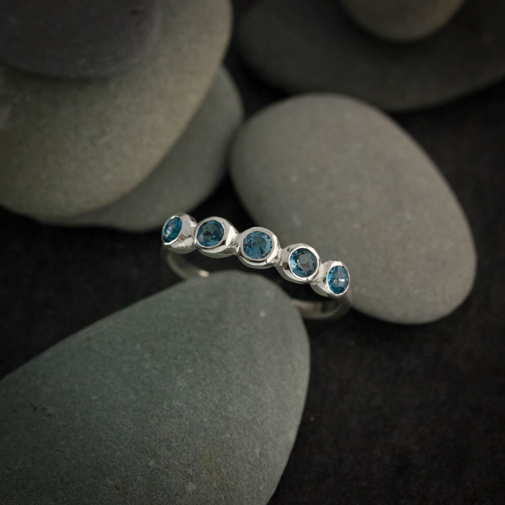 A handmade sterling silver London Blue Topaz Multistone ring by Cassin Jewelry.