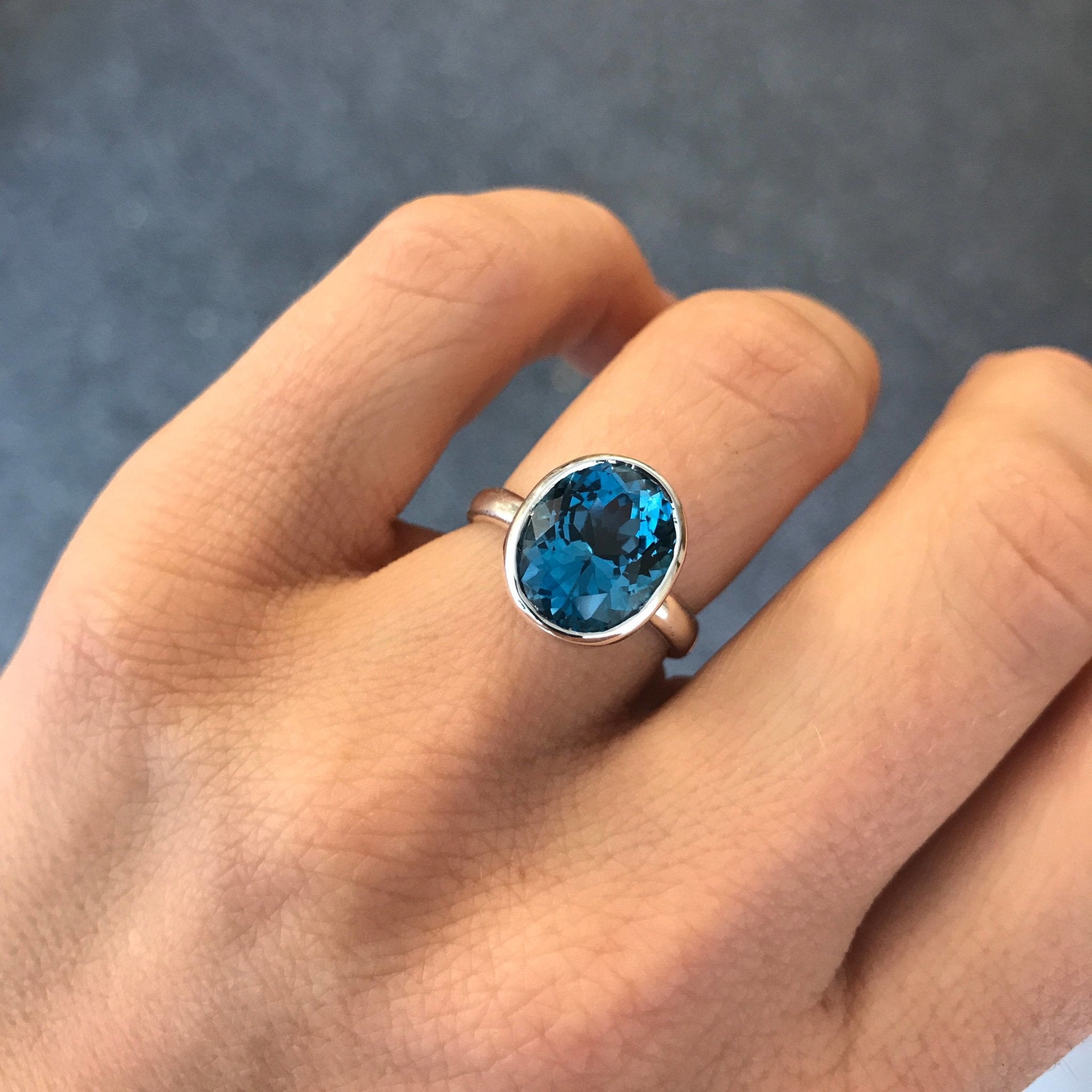 Blue topaz deals ring designs