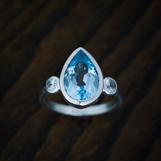 Pear Shaped Three Stone Blue Topaz Ring - Madelynn Cassin Designs